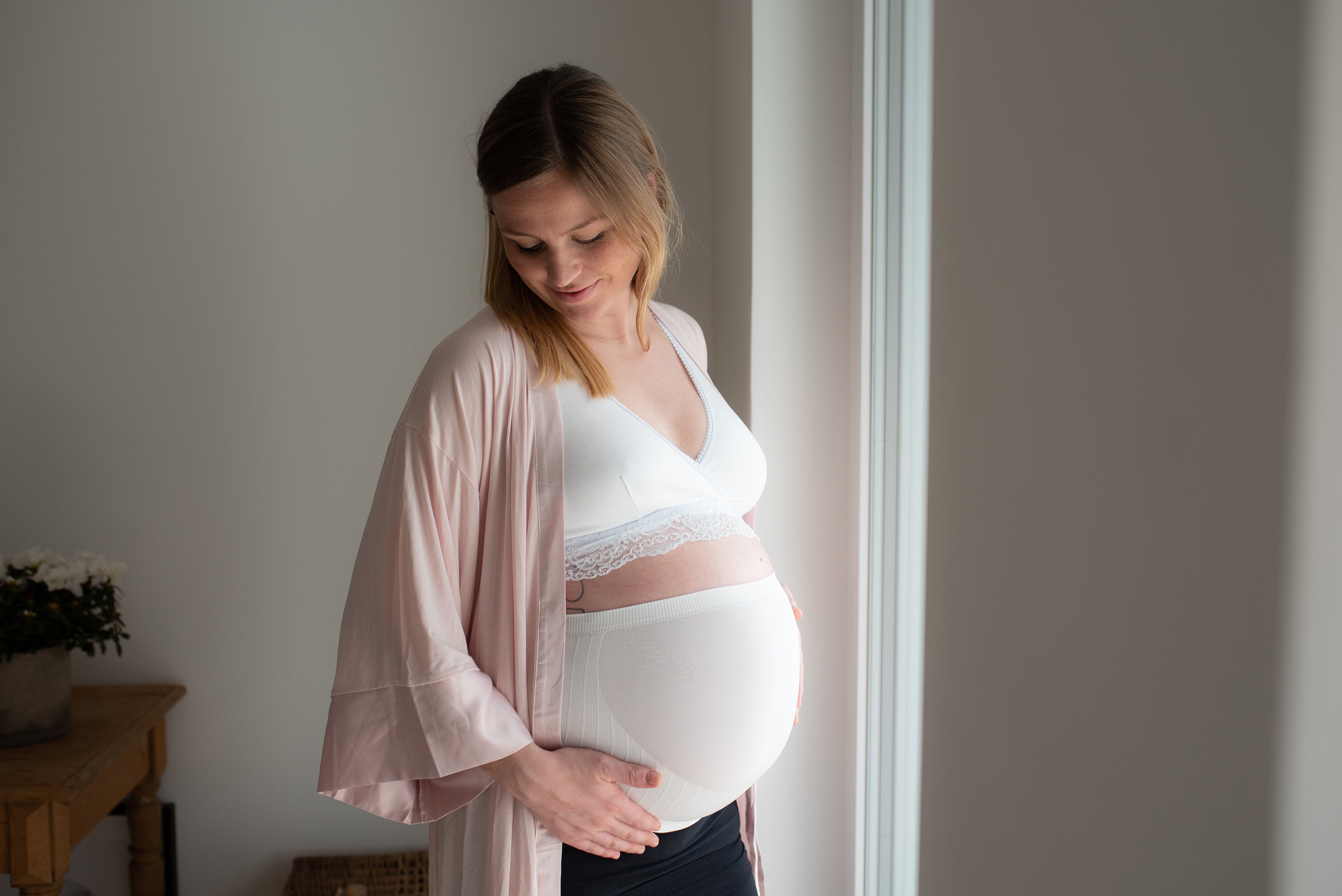 Oppustet mave tidlig graviditet: tegn og gode råd